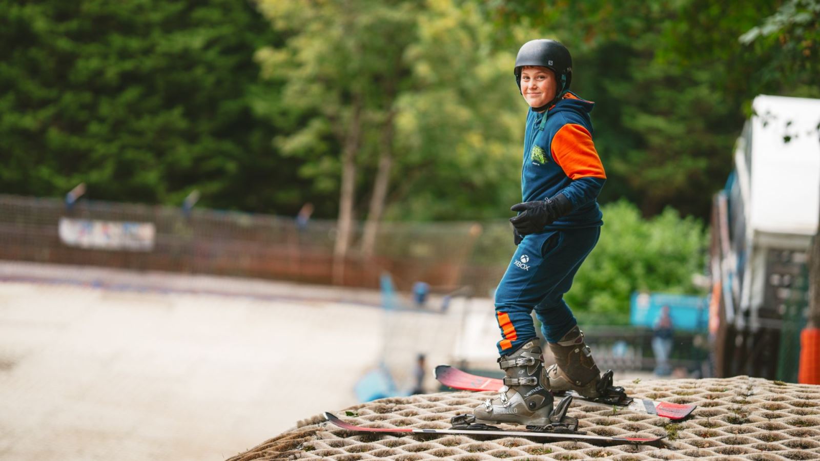 Child on a dry ski slope